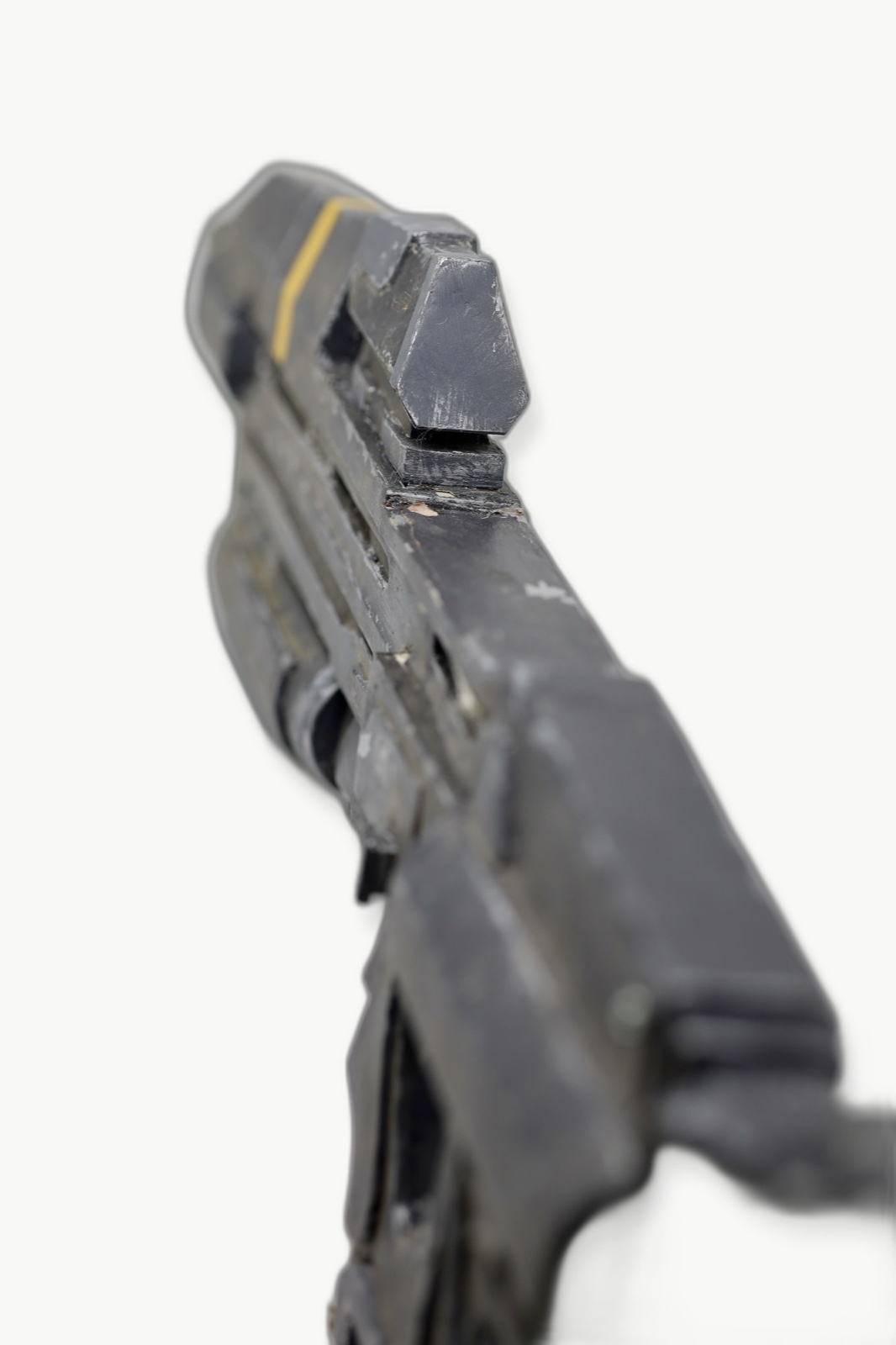 Rear close-up of the Dawn Under Heaven assault rifle prop sight and worn body