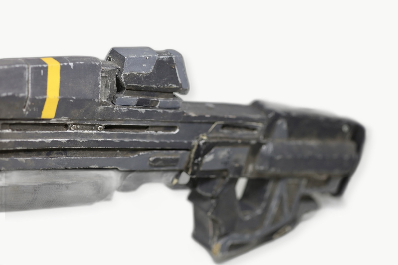Close side view of the Dawn Under Heaven assault rifle prop with the top sight visible
