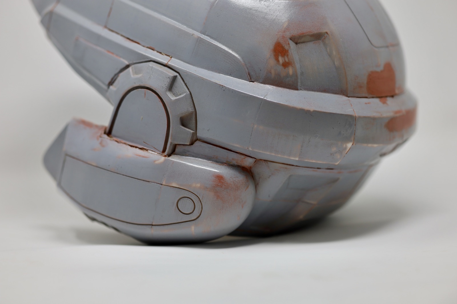 Back side close-up of the 3D-printed trooper helmet shell with red filler marks