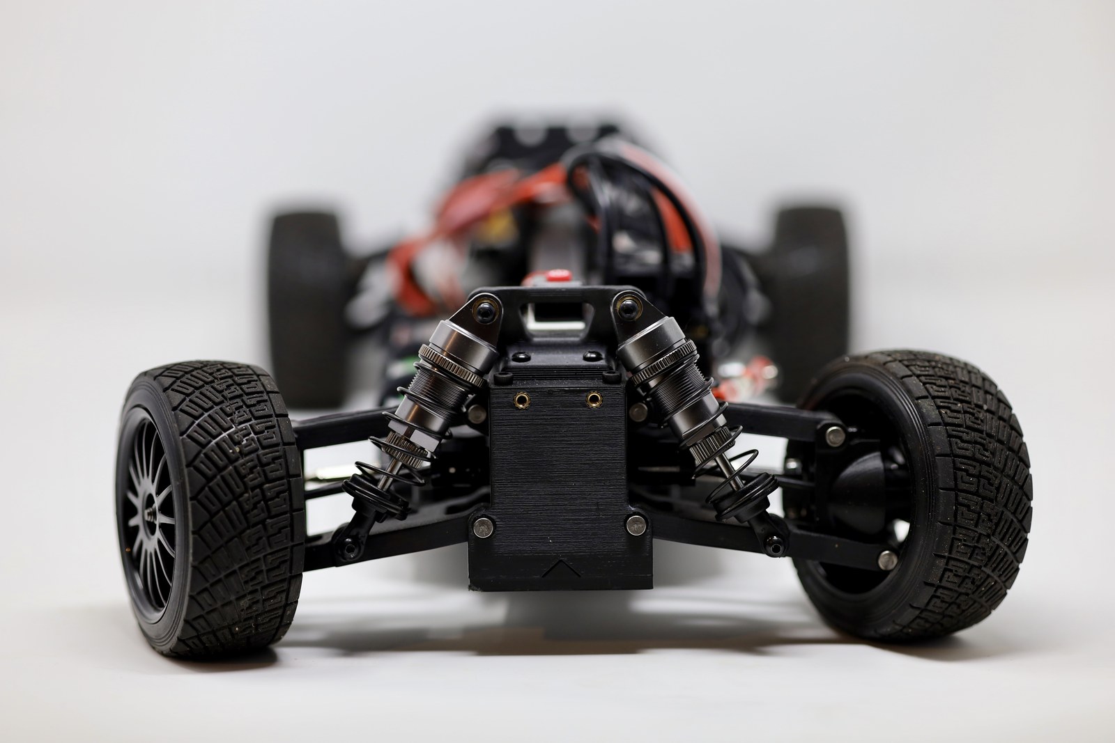 Front view of the 3D printed RC car suspension and shock towers