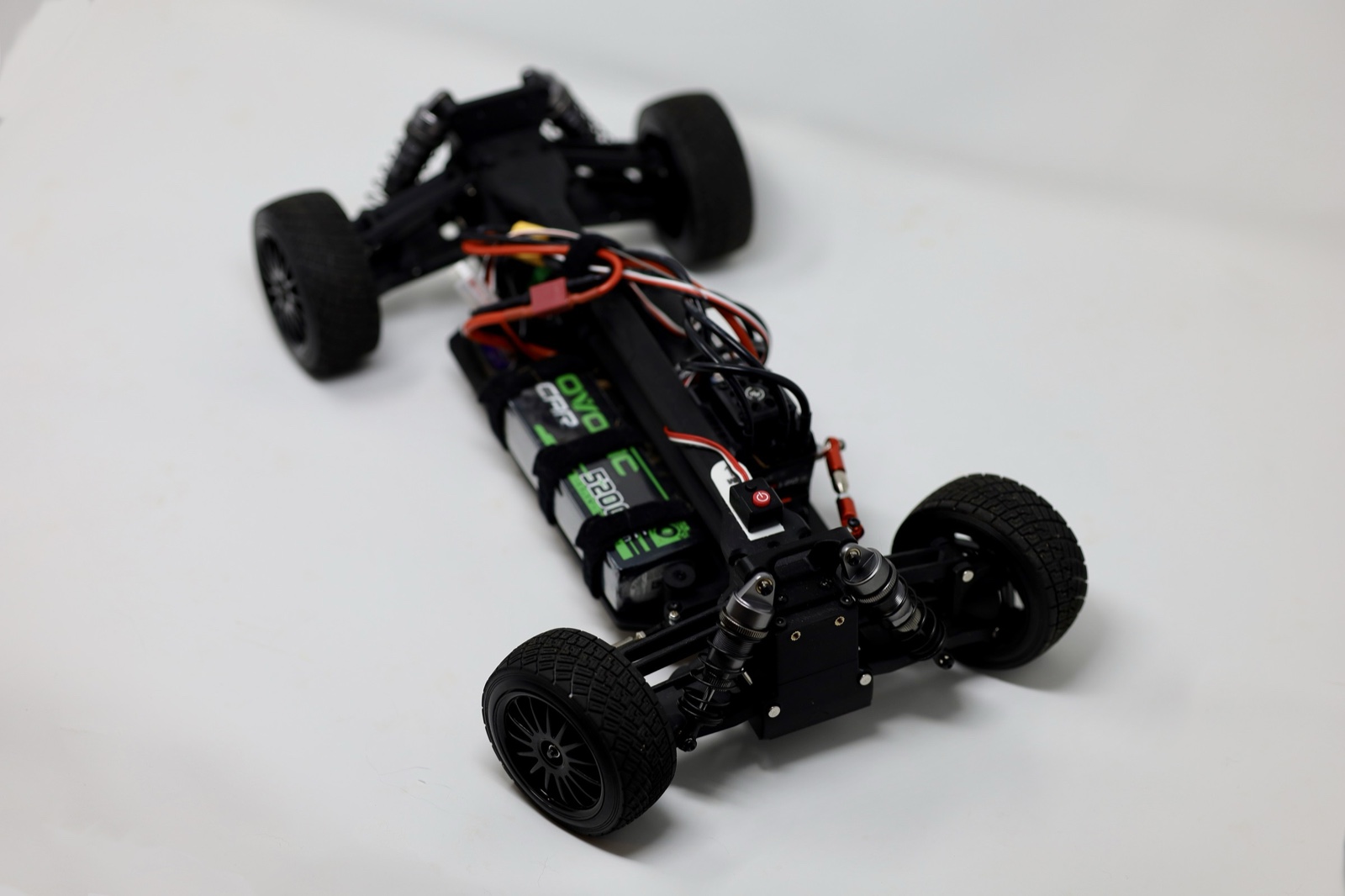 Overhead view of the 3D printed RC car chassis with batteries and electronics installed